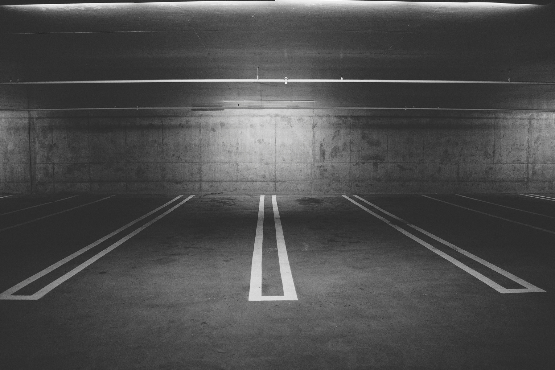 Grayscale Photography of Empty Parking Lot